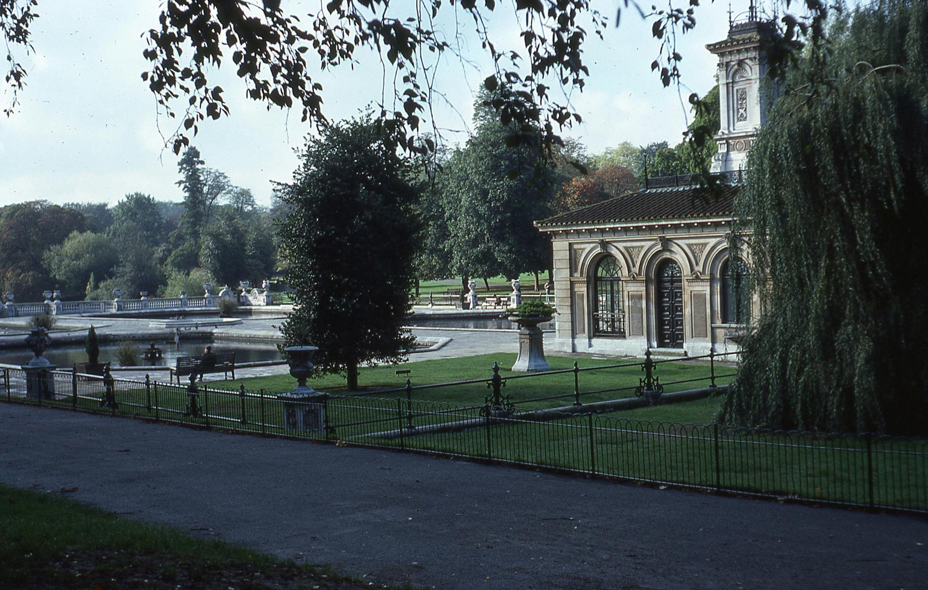 garden in hyde park and a concrete building